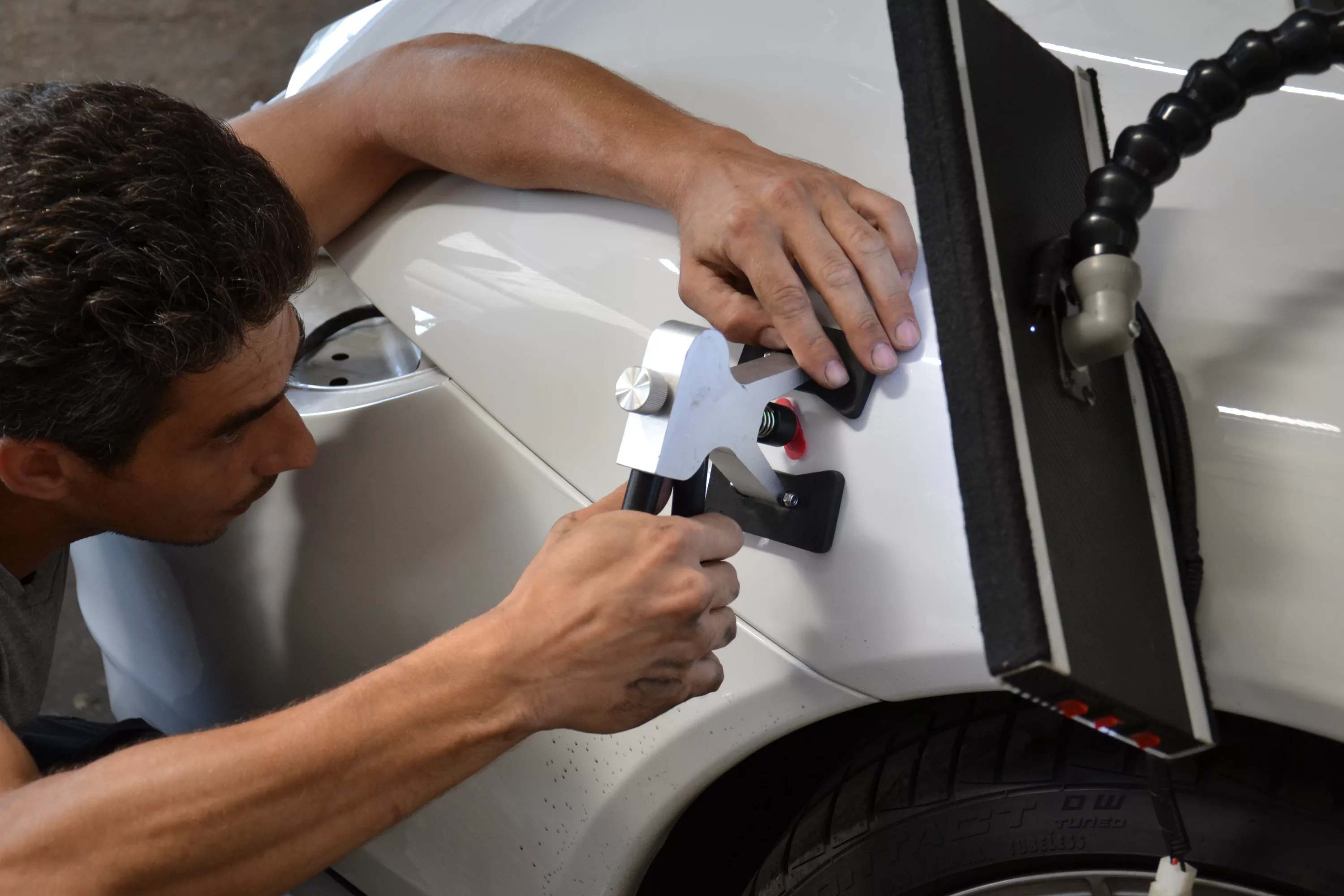 Hail Damage Repair & Auto Body Restoration: Precision Car Paint Solutions.